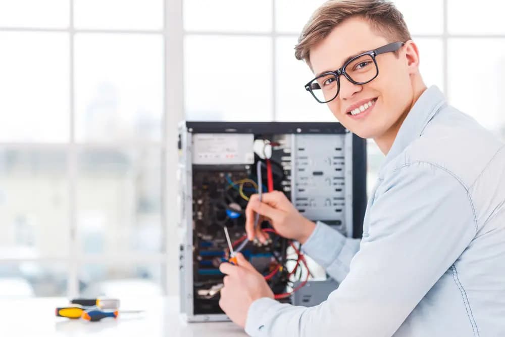 Desktop computer being serviced on a Jormis workbench
